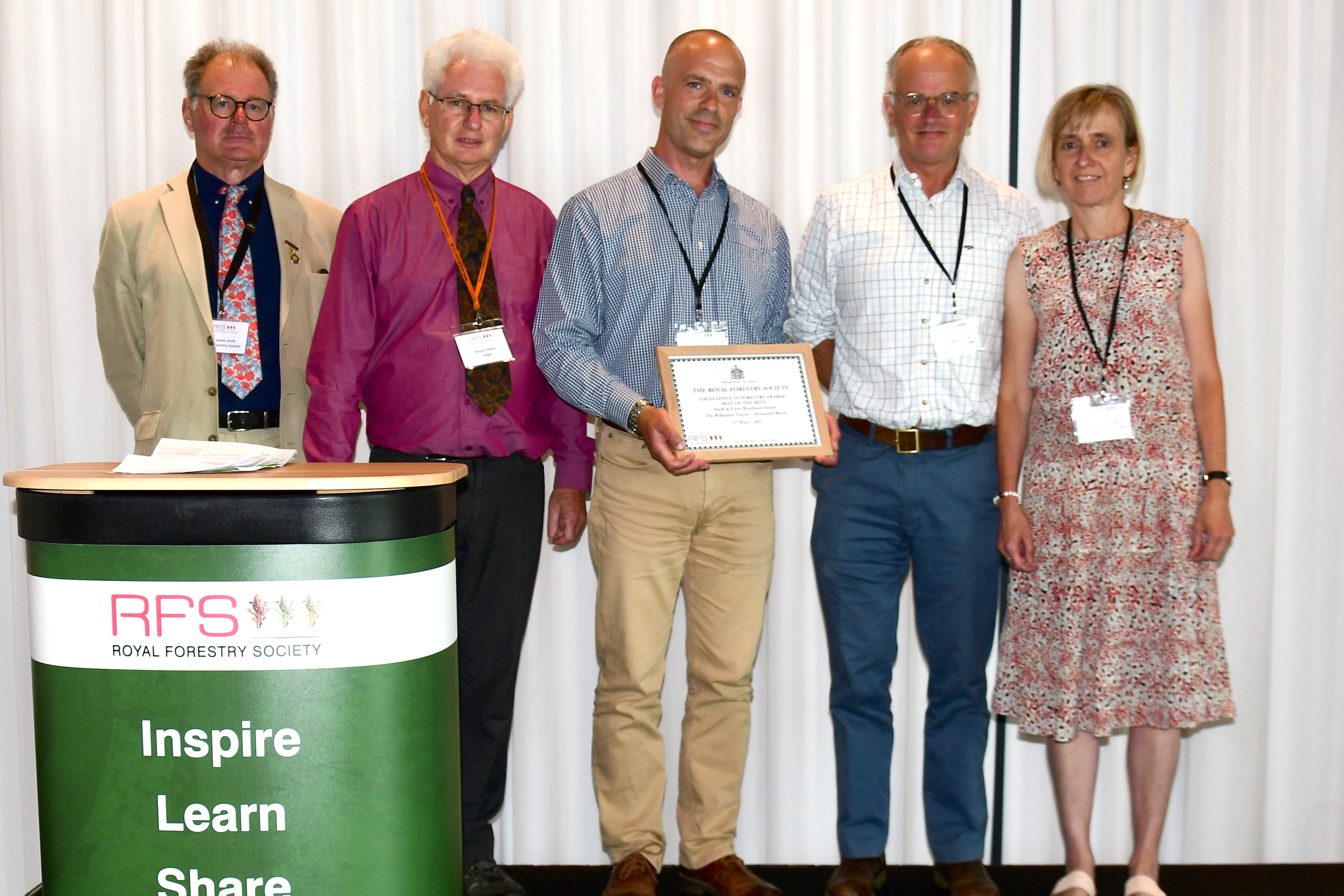 From left to right: RFS President Sir James Scott, judge Bryan Elliott and FSC UK’s Owen Davies present second prize in the Small and Farm Woodlands Award to Will and Sue Wilkinson for Broomhill Wood, Gloucestershire