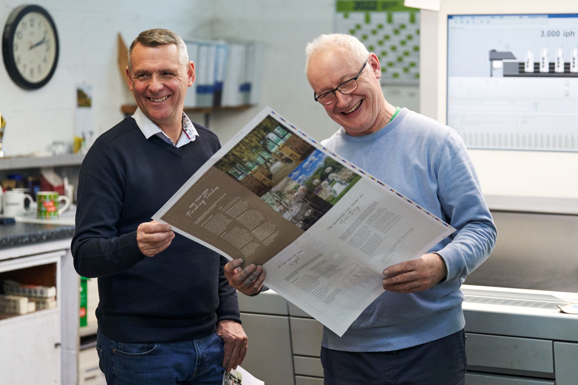 Production staff in the Ruddocks print factory during a quality process.