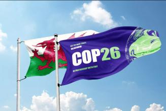 Climate Cymru and COP26 flag
