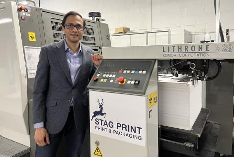 Managing director Sushil Patel with Komori press
