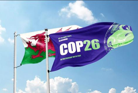 Climate Cymru and COP26 flag