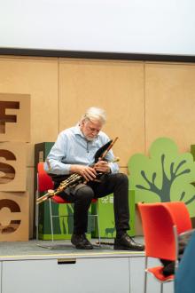 FSC UK 30th Anniversary Hubert playing Irish pipes